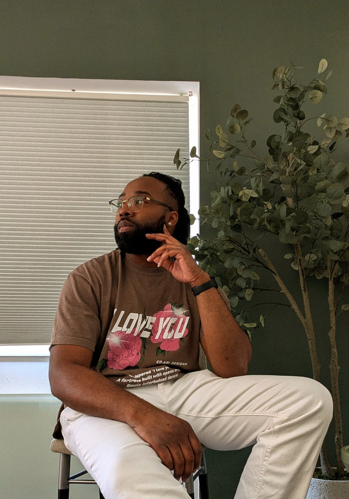 Our model is 6'3 “and wears a size 2XL shirt in the espresso variation of the Whispered “I Love You” tee!